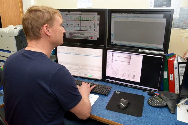 Principal Beamline Scientist Nathan Cowieson in the Control Cabin of beamline B21.