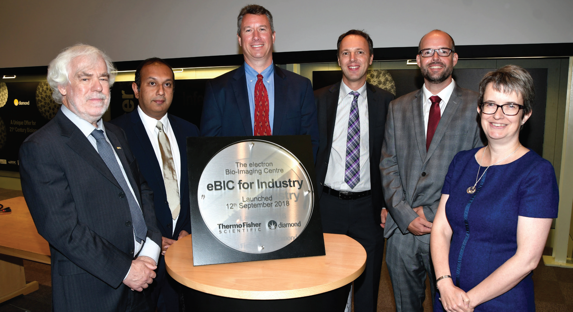 Celebrating the Thermo Fisher Scientific agreement during the official launch of eBIC. Left to right: Dave Stuart, Diamond Light Source, Rishi Matadeen, Dan Shine and Raymond Schrijver, Thermo
<br/>Fisher Scientific, Jason van Rooyen and Elizabeth Shotton, Diamond Light Source.