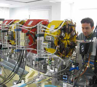 Figure 4: New DDBA quadrupole (red) and sextupole (yellow) magnets undergoing magnetic alignment.