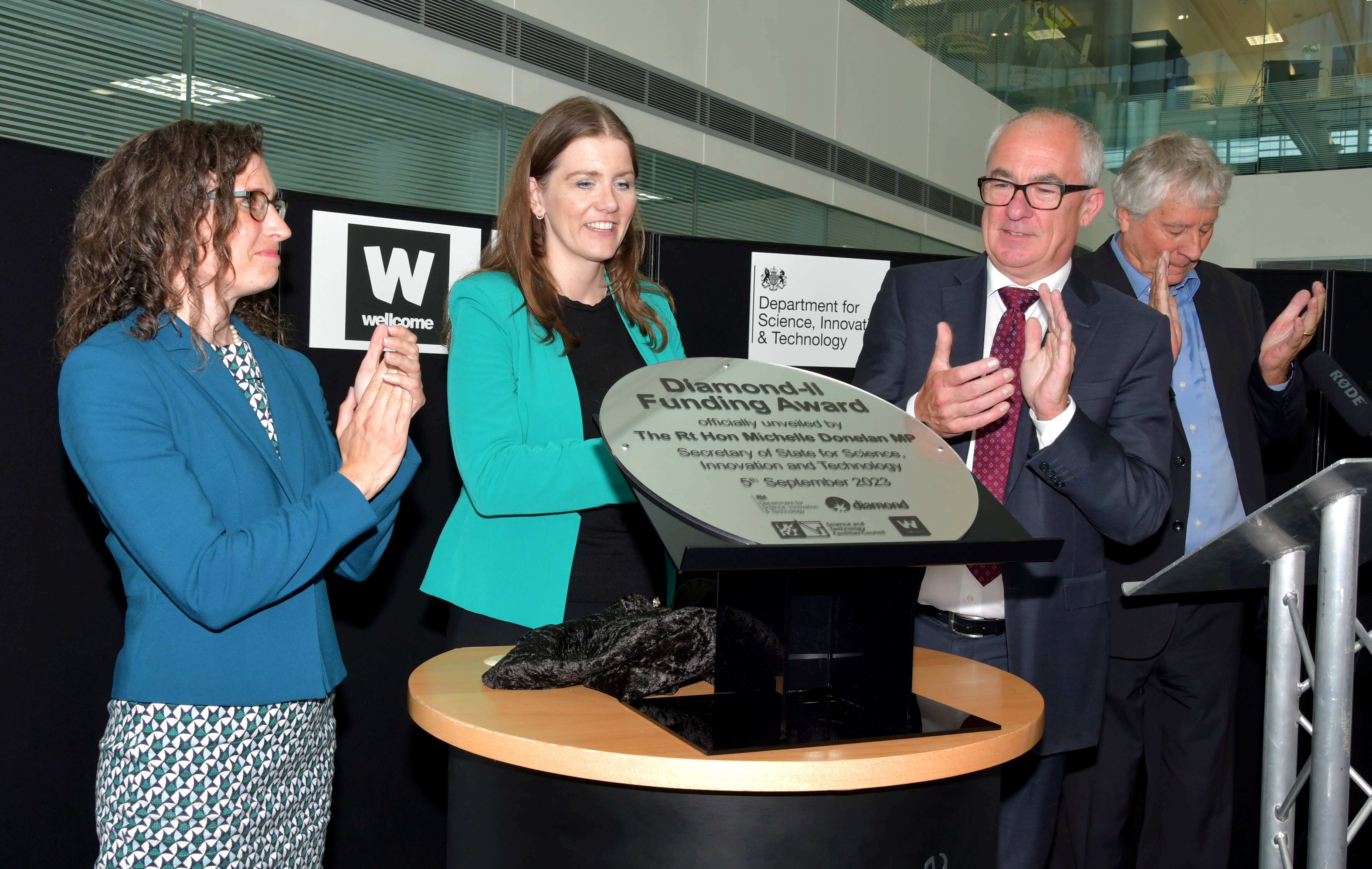 The celebratory plaque for the funding announcement for Diamond-II is unveiled.<br/>L to R: Beth Thompson MBE Chief Strategy Officer at Wellcome, Secretary of State for Science, Innovation and Technology, the Rt Hon Michelle Donelan MP,  Executive Chair of STFC Professor Mark Thomson, and Sir Adrian Smith, Chair of the Board of Diamond