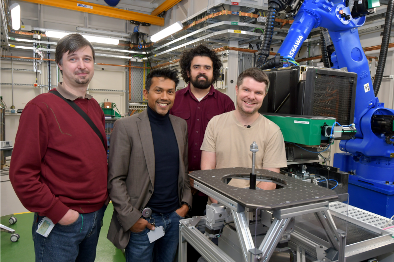 The research team studying the Bennu asteroid at Diamond Light Source. From left to right, Dr Alberto Leonardi, Beamline Scientist on DIAD at Diamond Light Source, Dr Sharif Ahmed, Principal Beamline Scientist on DIAD at Diamond Light Source, Dr Liam Perera, Beamline Scientist on DIAD at Diamond Light Source, and Dr Ashley King, planetary scientist from the Natural History Museum
