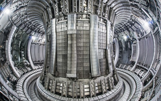 How will neutron irradiation affect the superconducting magnets in fusion power plants?