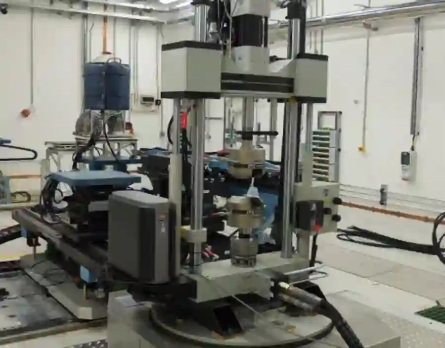 A PE cell can be mounted on I12's sample stage. Shown here is a 100 kN rig on the stage.
