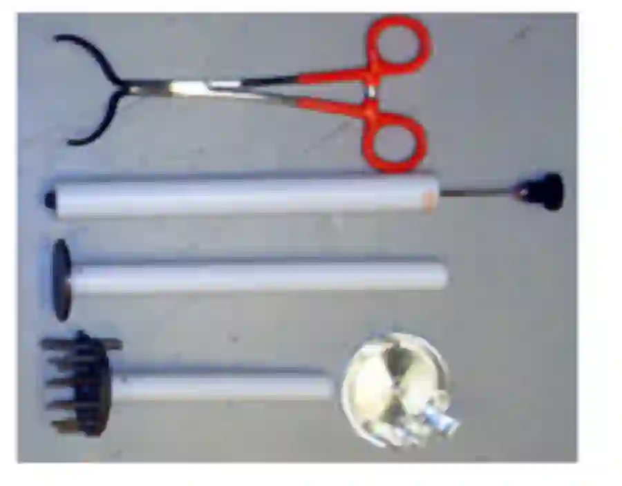 Bent tongs, vial push, puck wand and puck separator tools