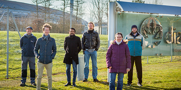 David Collins (second from left) from University of Birmingham with the DIAD beamline team