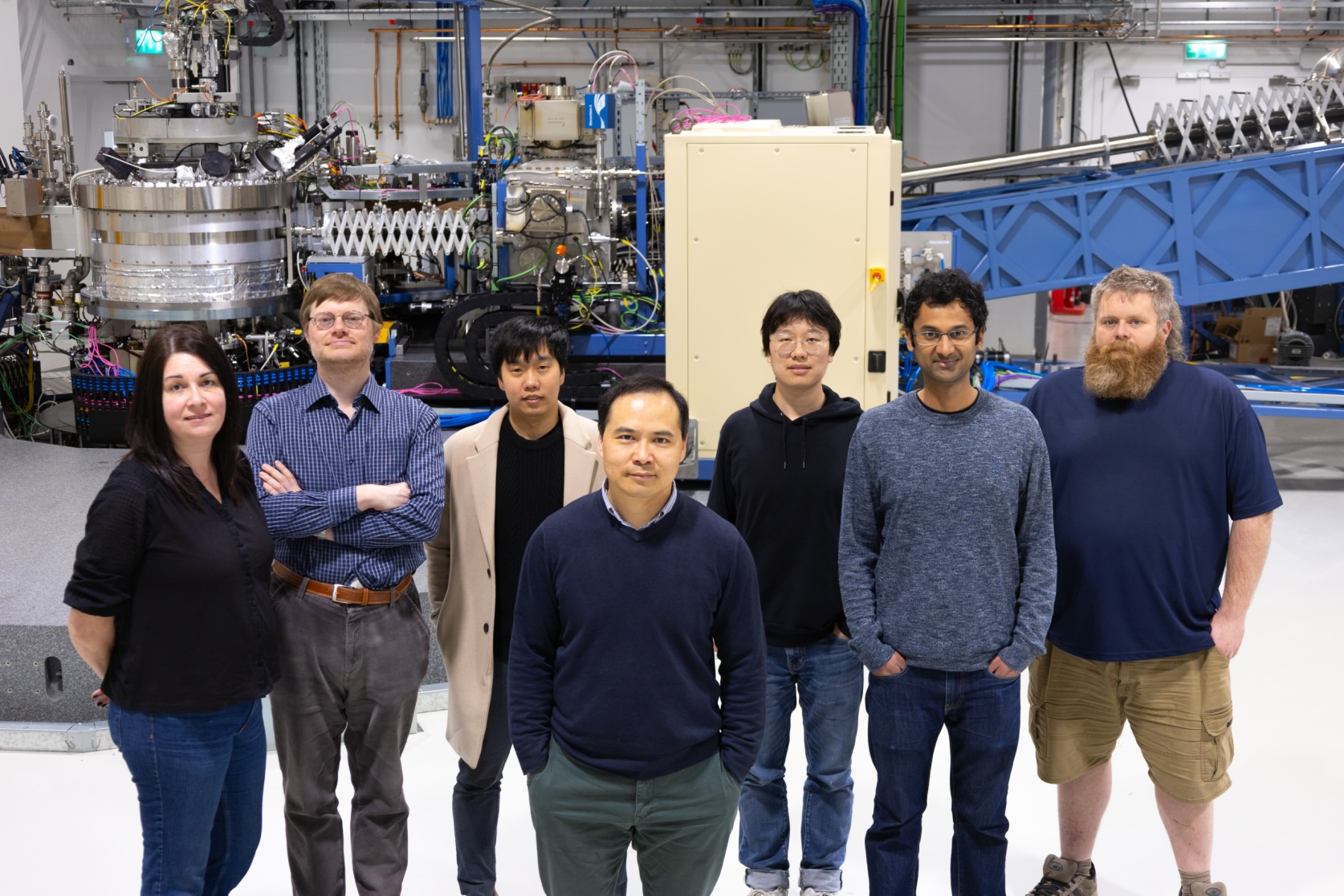 The I21 team alongside the beamline spectrometer.