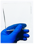 Figure 1. Photograph of the large-sized MIOC glass through crystallization-suppressing approach of ZIF-7-III.