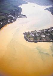 A Cornish river contaminated with iron oxyhydroxide mineral particles