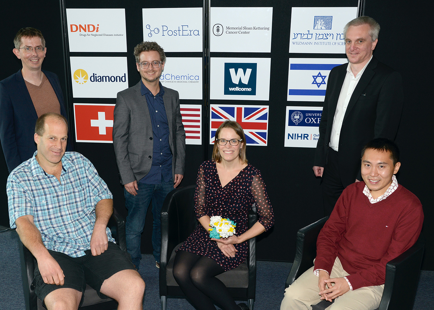 Covid Moonshot Collaborators – left to right: Benjamin Perry, Discovery Open Innovation Leader at DNDi; Frank von Delft, Professor of Structural Chemical Biology at the University of Oxford and Principal Beamline Scientist at Diamond Light Source; John Chodera, Associate Member at the Memorial Sloan Kettering Cancer Center and founding member of the Folding@home Consortium; Annette von Delft, Translational Scientist at the University of Oxford ; Ed Griffen, Technical Director and co-founder of MedChemica;  Alpha Lee, Chief Scientific Officer at PostEra and Faculty Member at the University of Cambridge.