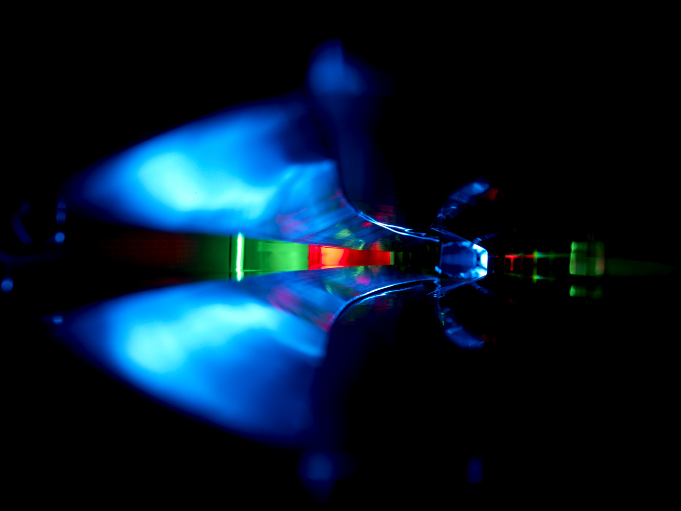 Inside a vacuum pipe, where electrons travel at nearly the speed of light, painted with light. Proving that science can be beautiful.