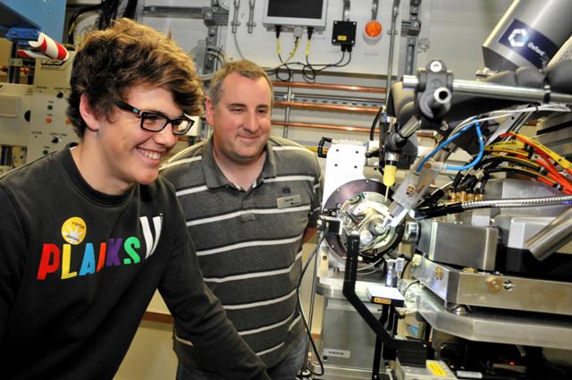 A member of the public explores Diamond's I04 beamline on an open day