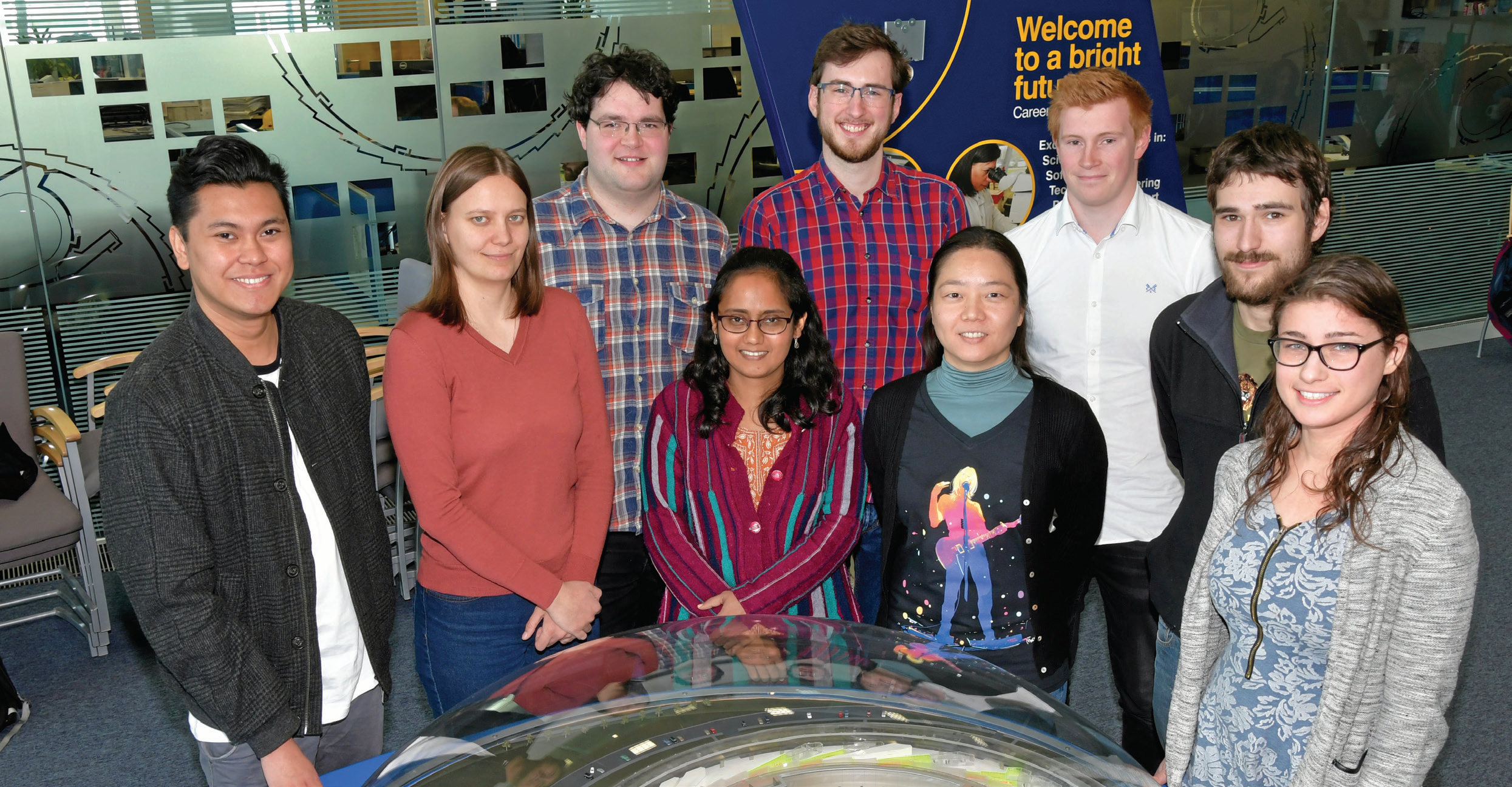 Spectroscopy PhD students and PDRAs, from left to right: James
<br/>Bucag, Iuliia Mikulska, Evan Lynch, Sylvia Britto, Pip Hellier,
<br/>Tathiana Kokumai, Alex Mayer, Steve Richards, Hayley Simon.