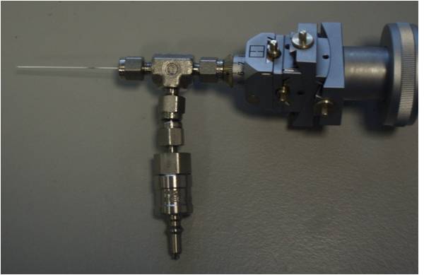 The low pressure capillary gas cell