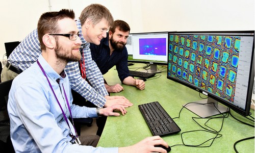 Manfred Schuster and Peter Ellis from Johnson Matthey are the first users (front, middle) on I14 with Principal Beamline Scientist, Paul Quinn (back).