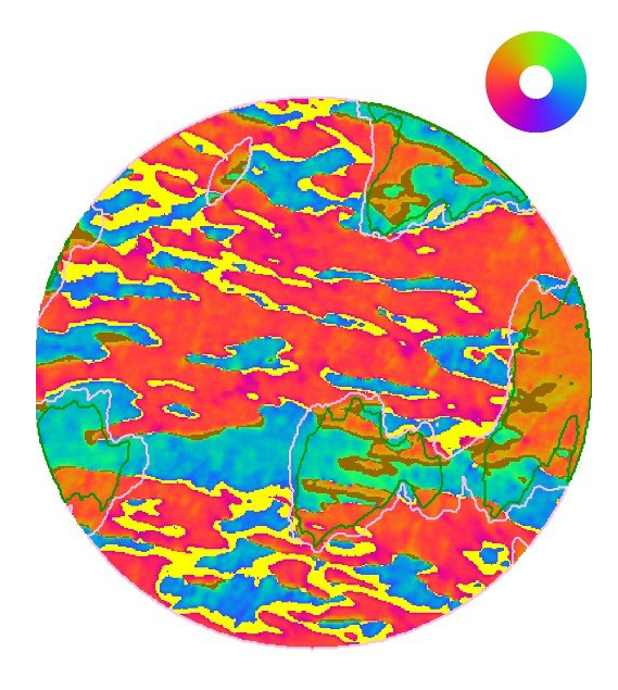 Magnetic vector map (50 µm field of view) describing the magnetisation of a Ni film while applying 50 V across the ferroelectric substrate of PMN-PT. The colour wheel identifies magnetisation direction. Yellow and brown denotes regions whose magnetisation was unaffected by the voltage.