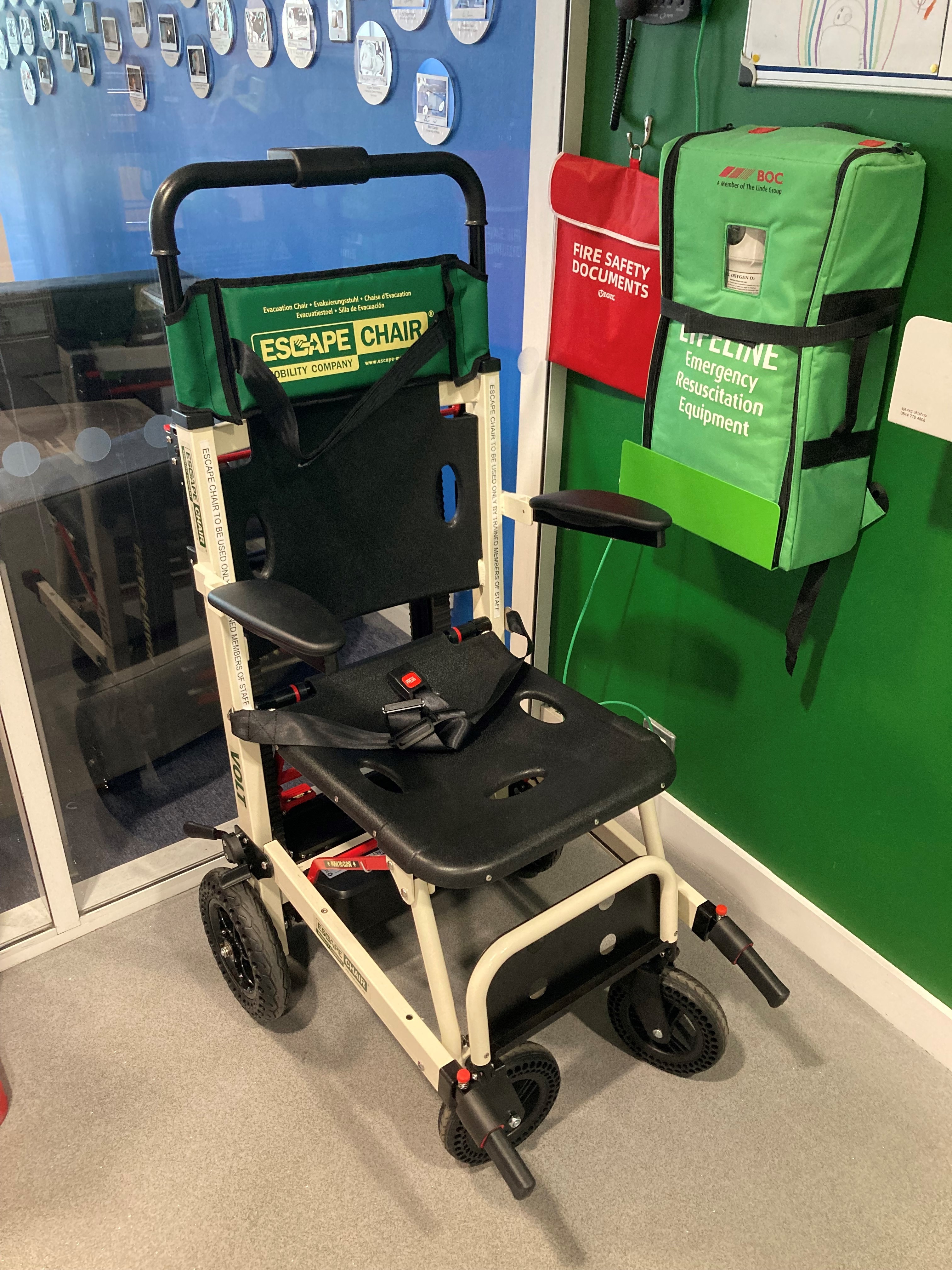 Evacuation Chair with motorised tracks to allow evacuation up or down stairways