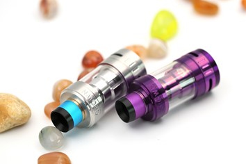Vaping mixtures may contain flavour compounds. (Royalty-free image of vaping devices.)