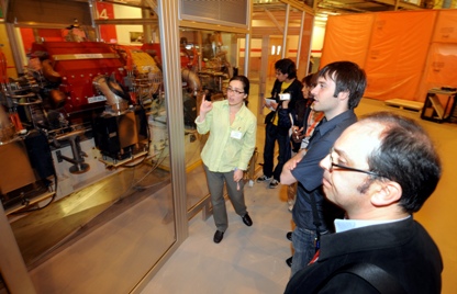 Emily Longhi explaining how the Diamond synchrotron works during the post-conference visit