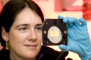 Dr Joanna Collingwood examining a scientific sample about to be placed on one of Diamond's beamlines.